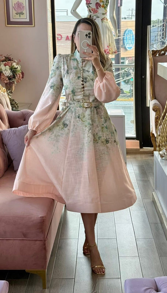 Vestido midi manga larga cuello alto y estampado floral
