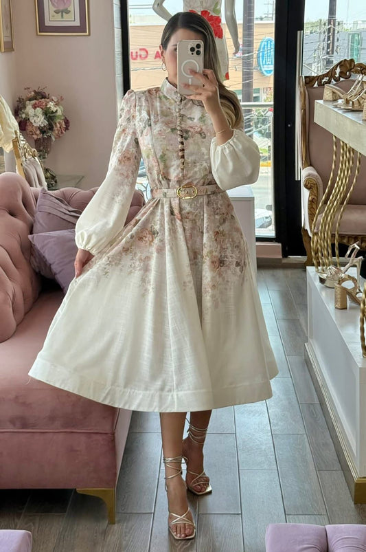 Vestido midi manga larga cuello alto y estampado floral